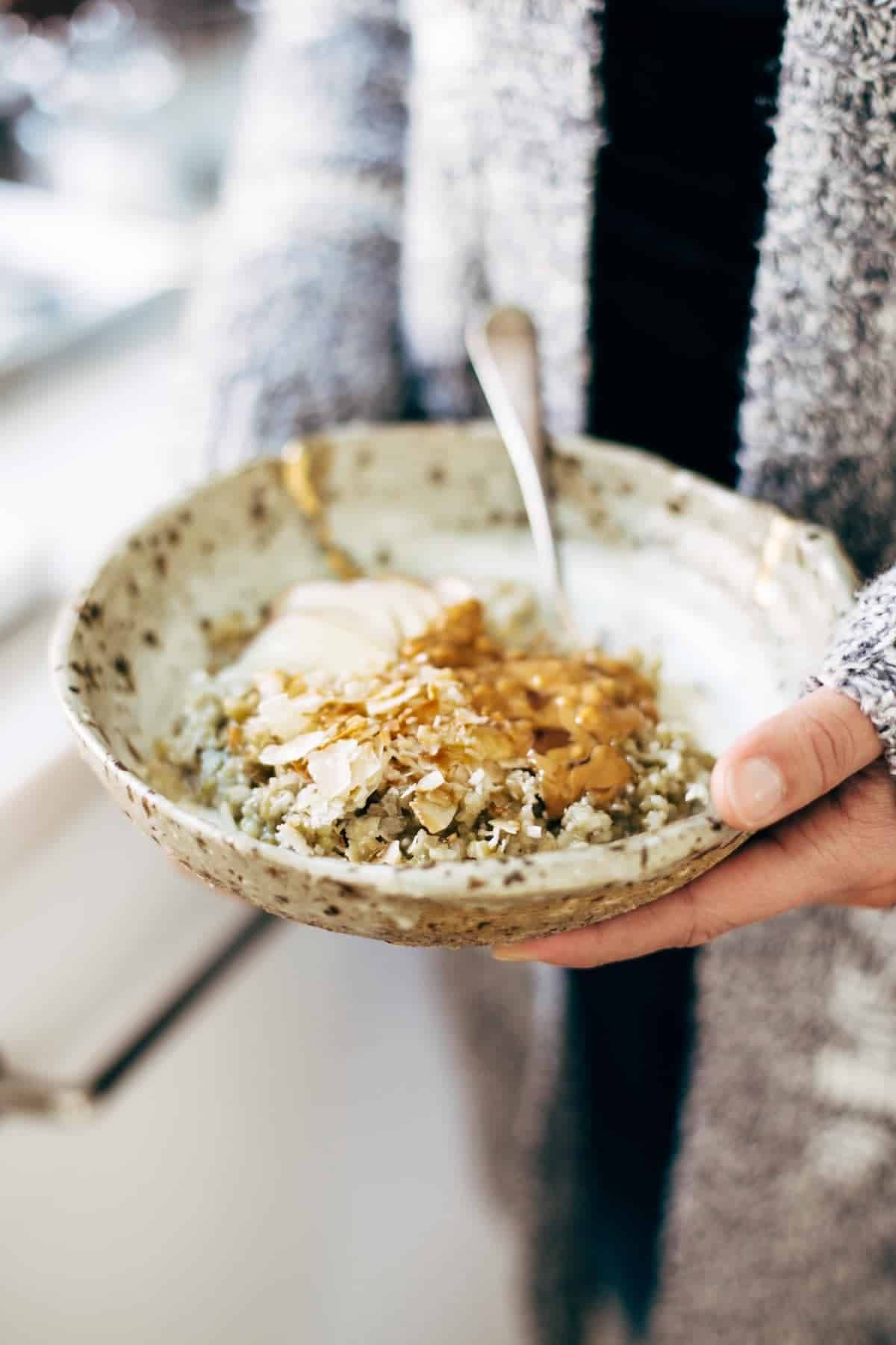 Simple Coconut Breakfast Porridge - a wholesome and cozy breakfast recipe with quinoa, oats, coconut milk, and one surprise ingredient! | pinchofyum.com